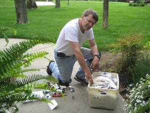 one of our professionals is checking his equipment for replacement parts